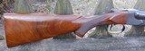 WINCHESTER MODEL 21
TOURNAMENT SKEET GRADE - 12 GAUGE - 28INCH BARRELS WITH SOLID RAISED RIB MARKED MOD. / FULL - 5 of 12