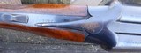 WINCHESTER MODEL 21
TOURNAMENT SKEET GRADE - 12 GAUGE - 28INCH BARRELS WITH SOLID RAISED RIB MARKED MOD. / FULL - 9 of 12