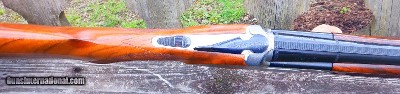 B. RIZZINI - 16 GA. OVER/UNDER ARTEMIS MODEL - TWO SETS OF VENT RIB BARRELS - 26 IC/M & 27 1/2