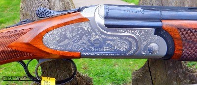 B. RIZZINI - 16 GA. OVER/UNDER ARTEMIS MODEL - TWO SETS OF VENT RIB BARRELS - 26 IC/M & 27 1/2