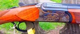 B. RIZZINI -410 GAUGE O/U
AURUM SMALL ACTION - CASE COLORED ACTION - 28" VENT RIB BLS W/CHOKE TUBES - STRAIGHT HAND STOCK
- - 5 of 11