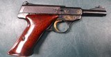 BROWNING
NOMAD .22 CAL. PISTOL WITH 4 1/2" BARREL - SCROLL ENGRAVING WITH GOLD WASH ACCENTING THE ENGRAVING. - 3 of 7