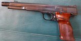SMITH & WESSON - MODEL-41 -- .22 CAL. DEMI AUTO PISTOL - TARGET CONFIGURATION - 7" BARREL WITH MUZZEL BRAKE - EARLY GUN - 1 of 10