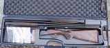 BERETTA 686 ONYX  0/U - TWO GAUGE COMBO  - 20 GAUGE 28"  BLS. & 28 GAUGE  28" BARRELS - MOBILE CHOKES - BLACK RECEIVER - 1 of 10