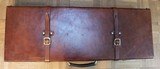LEATHER COVERED HARD CASE FOR GUN WITH TWO SETS OF BARRELS