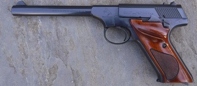 COLT HUNTSMAN .22 CAL SEMI AUTO PISTOL WITH 6 INCH BARREL AND TARGET GRIPS