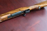 DAKOTA 22 WITH OPTIONS "FRENCH WALNUT, WRAP CHECKERING, INLETTED SWIVEL STUDS "LEUPOLD BASES, 5 PANEL CHECKER BOLT, JEWEL TRIGGER" - 9 of 15