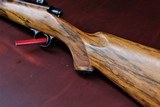 DAKOTA 22 WITH OPTIONS "FRENCH WALNUT, WRAP CHECKERING, INLETTED SWIVEL STUDS "LEUPOLD BASES, 5 PANEL CHECKER BOLT, JEWEL TRIGGER" - 3 of 15