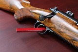 DAKOTA 22 WITH OPTIONS "FRENCH WALNUT, WRAP CHECKERING, INLETTED SWIVEL STUDS "LEUPOLD BASES, 5 PANEL CHECKER BOLT, JEWEL TRIGGER" - 14 of 15