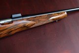 DAKOTA 22 WITH OPTIONS "FRENCH WALNUT, WRAP CHECKERING, INLETTED SWIVEL STUDS "LEUPOLD BASES, 5 PANEL CHECKER BOLT, JEWEL TRIGGER" - 15 of 15