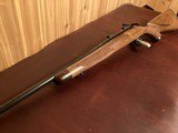 REMINGTON CUSTOM SHOP MODEL 547 C GRADE .22 LR WITH UPGRADED HAND RUBBED OIL FINISH AND HAND CHECKERING - 2 of 12