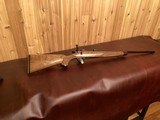 REMINGTON CUSTOM SHOP MODEL 547 C GRADE .22 LR WITH UPGRADED HAND RUBBED OIL FINISH AND HAND CHECKERING - 8 of 12