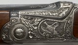 SKB model 500, 20 gauge O/U, Awesome engraving by Master engraver Neil Hartliep, Mint Condition