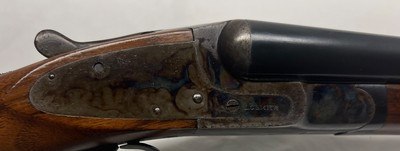 LC Smith, 16-gauge double barrel, Featherweight, Good Case color, Very Good Cond. 102 years old