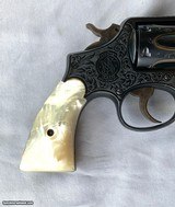 Smith & Wesson (S&W) Military & Police (Pre-Model 10)
38 S&W,
Mother-of-Pearl - 3 of 14