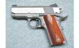 Colt Defender,
9mm Luger - 2 of 2