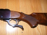 Ruger
#1 in 458 Win Mag , Mint with Original Box ,Paperwork, Sling Swivels, Rings , Lock - 4 of 15
