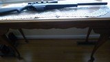 Mossberg model 695 12 gauge slug gun - 1 of 11