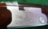 Beretta O/U Model S687 12 Gauge with a 28" ported barrels- 11 of 15