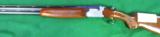 Beretta O/U Model S687 12 Gauge with a 28" ported barrels- 1 of 15