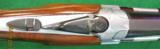 Beretta O/U Model S687 12 Gauge with a 28" ported barrels- 15 of 15