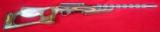 Volquartsen .22 WMR with Brown/Gray Laminated Lightweight Thumbhole Stock - I-FLUTE - 1 of 2