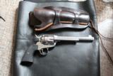 ruger 45 colt vaquero bright stainless 7 1/2"
with heiser holster - 1 of 5
