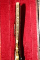 custom Miniature Flintlock muzzleloading rifle
.22 cal.
real working 28" long
engraved - 11 of 13