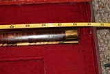 custom Miniature Flintlock muzzleloading rifle
.22 cal.
real working 28" long
engraved - 2 of 13