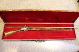 custom Miniature Flintlock muzzleloading rifle
.22 cal.
real working 28" long
engraved - 1 of 13