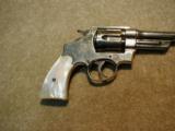  EXCEPTIONAL TRIPLE LOCK MODEL, .44 SPECIAL, 6 1/2"
REVOLVER MADE 1913 - 8 of 11