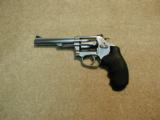 S&W
MODEL 63-4 .22LR KITGUN WITH 8-SHOT CYLINDER AND 5" BARREL - 1 of 5