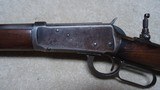 SPECIAL ORDER 1894 .38-55
ROUND BARREL RIFLE WITH HALF MAGAZINE (BUTTON MAG), #562XXX, MADE 1911 - 4 of 19