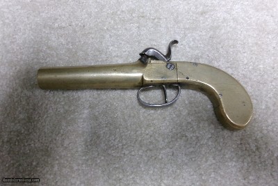 VERY UNUSUAL ALL BRASS PERCUSSION SINGLE SHOT .62 CALIBER PISTOL. All metal handguns are scarce and this one has great visual appeal.  It is unmarked