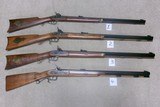 COLLECTION OF FOUR (4) THOMPSON-CENTER MUZZLE LOADING RIFLES: PRICED $695-$795 EACH - 1 of 10