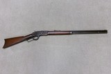 EARLY SPECIAL ORDER 1873 .44-40 OCT. RIFLE WITH EXTRA LENGTH 26” BARREL, MADE 1884. - 1 of 20