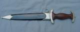 German WWII SA NSKK Dagger with scabbard, blade marked “TIGER SOLINGEN.”
- 2 of 13
