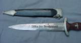German WWII SA NSKK Dagger with scabbard, blade marked “TIGER SOLINGEN.”
- 7 of 13