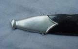 German WWII SA NSKK Dagger with scabbard, blade marked “TIGER SOLINGEN.”
- 13 of 13