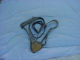 Civil War McClellen saddle Martingale with plain brass heart breast plate – complete with all straps.
- 1 of 9