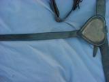 Civil War McClellen saddle Martingale with plain brass heart breast plate – complete with all straps.
- 4 of 9