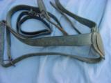 Civil War McClellen saddle Martingale with plain brass heart breast plate – complete with all straps.
- 2 of 9