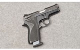 Smith & Wesson ~ Model 6904 ~ Semi Auto DA/SA Pistol ~ 9MM Parabellum - 1 of 7