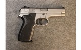 Smith & Wesson ~ 5946 ~ 9mm Luger - 1 of 2
