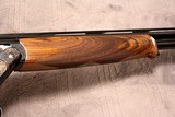 Caesar Guerini
Magnus Grade 28ga, 28" CASE COLORS & SELECT WOOD - 5 of 19