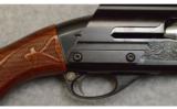 Remington ~ 1100 ~ 12 Gauge - 2 of 9