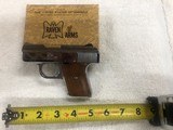 Raven Model MP 25 Nickel .25 Auto Pocket Pistol - 1 of 2