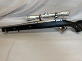 Ruger M77 MK II
26" 7MM Mag Stainless / Paddle Stock W/ Original Ruger Scope Mts & Simons Scope - 9 of 9