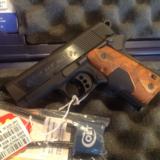 Colt New Agent 9mm with Crimson trace
- 4 of 6