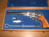 Smith & Wesson Model 29-2
8 3/8" Nickel Plated Revolver with Presentation Case and Accessories - 1 of 4